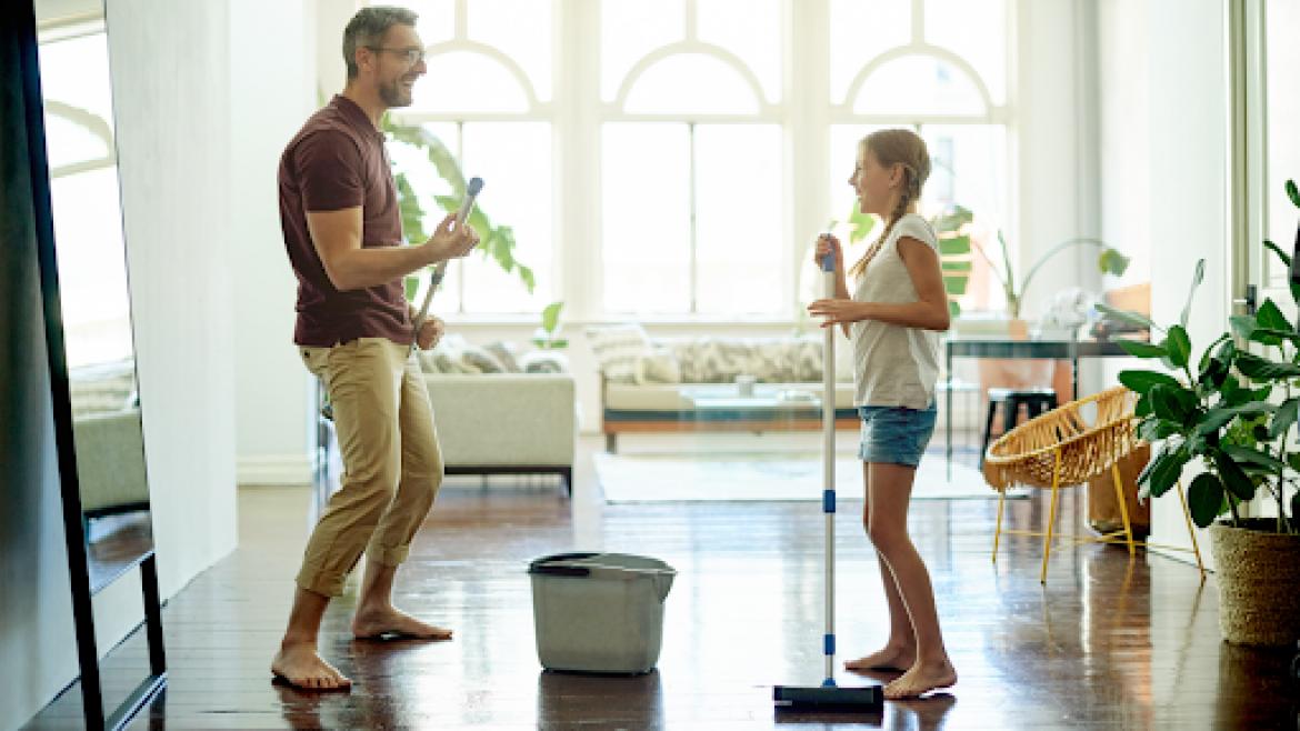 dad and daughter with mop and bucket