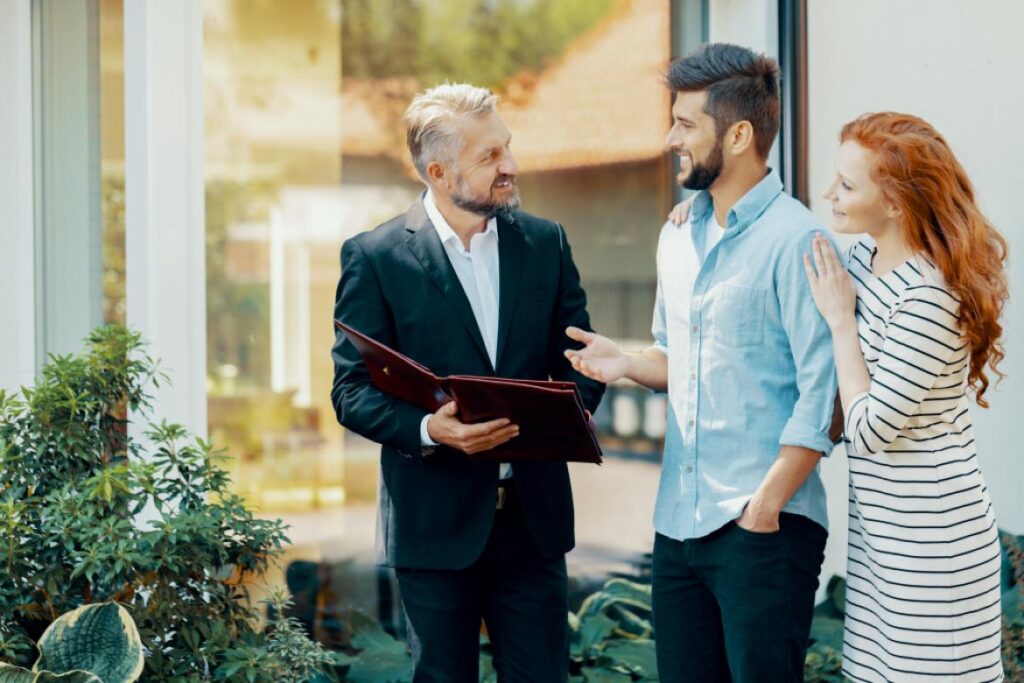 realtor talking to couple