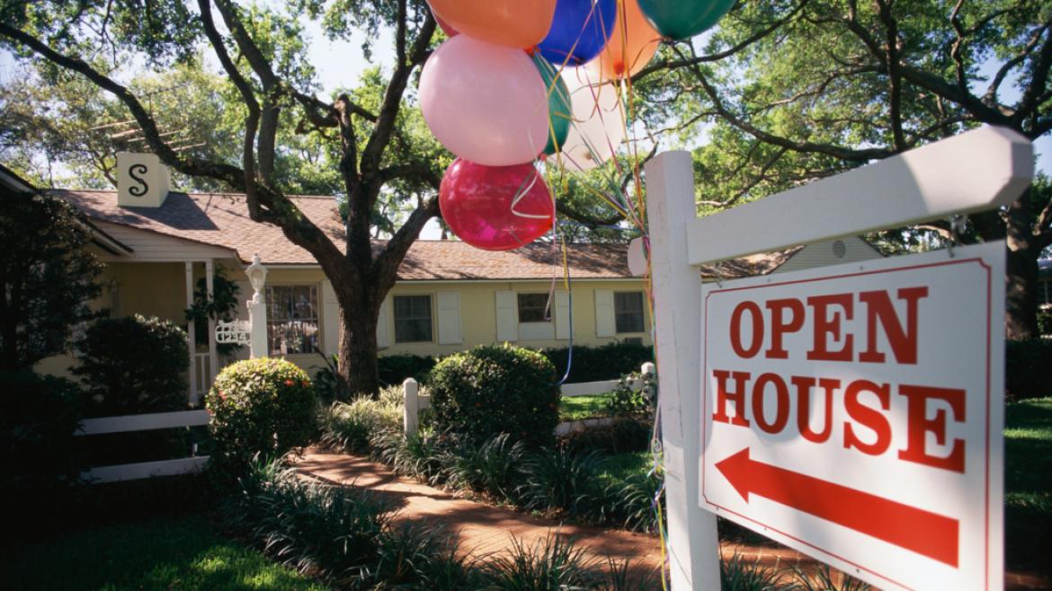 house with Open House sign in yard